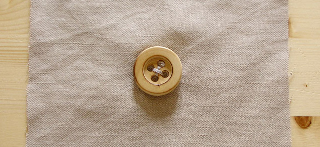 Cómo coser un botón